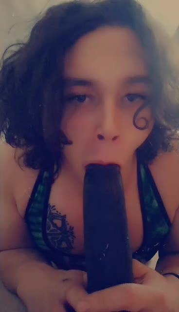 Sissy Jamie sucking on her dildo